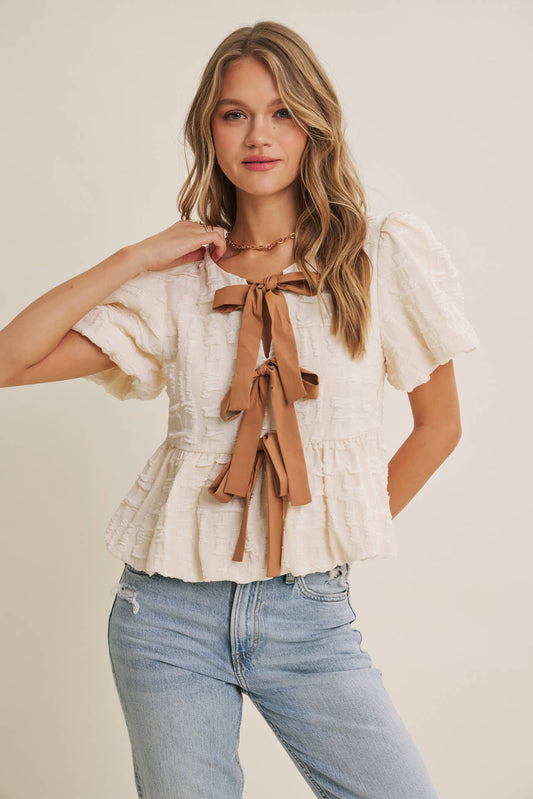 TEXTURED BOW FRONT BABYDOLL BLOUSE
